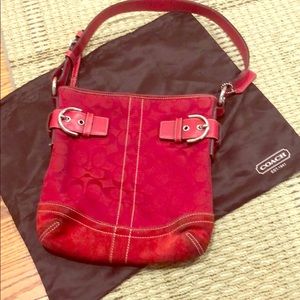 Coach purse. Red suede/canvas with silver buckles
